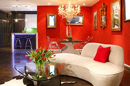 red nyc townhouse living room interior