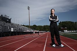 teenager standing on high school track
